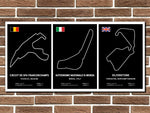 Three racing circuit posters on a brick wall background